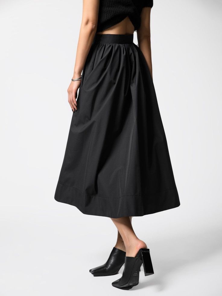 Classic mid-calf length flared and pleated skirt. Voluminous style. Oversized A line skirt. Model is in MINUSEY S. ✔️ Free worldwide express shipping over $100✔️ Loved by 6,500+ customers✔️ Limited edition collections, maximum style⠀⠀⠀⠀⠀⠀⠀⠀⠀Stay ahead of the trend with can’t-find-anywhere-else staples. Your closet will thank you 💕 * MINUSEY S = EU 34, US 2* MINUSEY M = EU 36, US 4* 100% Polyester* Dry clean* Made in Korea - Model Height: 172cm/5'7" (US2, EU34) Black A-line Voluminous Skirt, Flowy Gathered Skirt With Wide Hem, Black Pleated Wide Leg Culottes, Flowy A-line Maxi Skirt With Pleated Hem, Black A-line Pleated Skirt, Black Voluminous A-line Skirt, Black Midi Length Accordion Pleated Skirt, Relaxed Maxi Skirt With Pleated Wide Hem, Gathered Wide Hem Bottoms