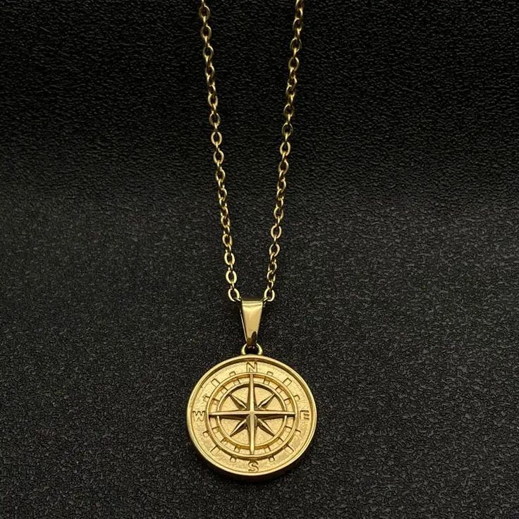 compass-necklace-gold Durable Metal Necklace As Gift, Durable Metal Necklace Gift, Durable Metal Necklaces As A Gift, Durable Metal Necklaces For Gifts, Nautical Style Metal Jewelry Gift, Gold Compass Design Necklace In Stainless Steel, Gold Stainless Steel Compass Necklace, Gold Stainless Steel Necklace With Compass Design, Metal Compass Design Round Necklace