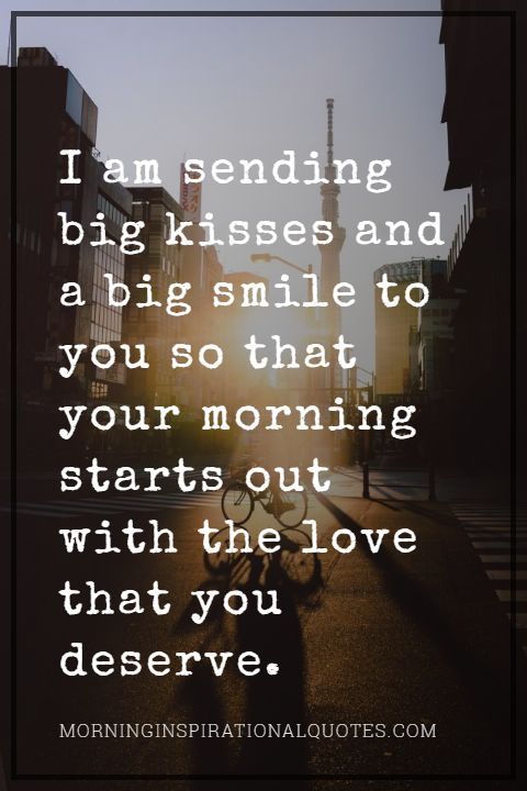 a bicycle sitting on the side of a road next to tall buildings with a quote about i am sending big kisses and a big smile to you so that your morning starts