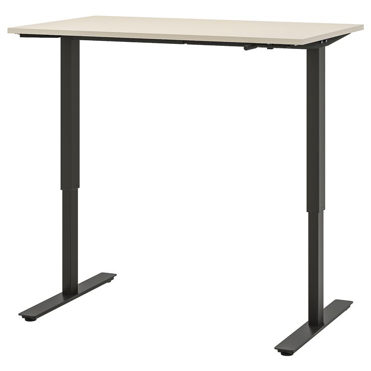 a standing desk with a white top and black legs