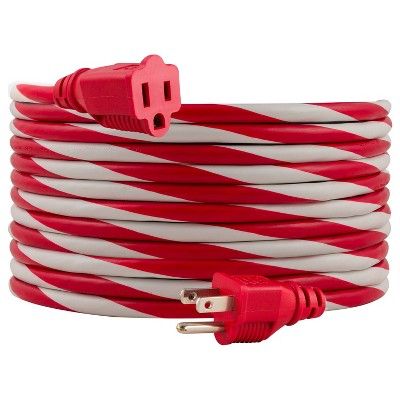 a red and white extension cord with two plugs on each end, attached to an outlet