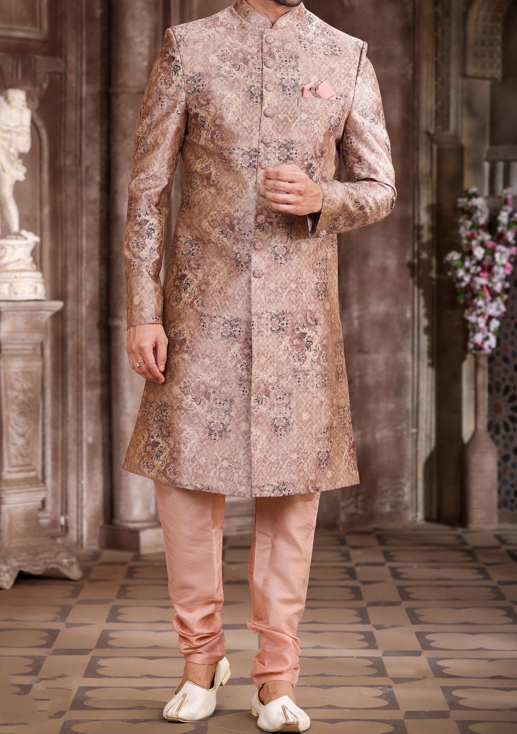 Ready-Made Sherwani With Trouser. All Over Jacquard Brocade Style Printed Fabric Top. Art Dupion Aligarhi Ready Made Trouser. Crafted in Chinese Collar Neck, and Full Sleeve. Satin Lining with Plain Work. High-Quality Matching Buttons. Please Note: The footwear shown in the picture is for presentation and photography purpose only. Color: There might be slight color variation due to lightings and flashes while photo shooting. The color may also vary because of different screen resolutions. Wash C Fitted Jamawar Sherwani For Wedding, Wedding Fitted Jamawar Sherwani, Transitional Brocade Salwar Kameez With Dabka Detailing, Semi-stitched Brocade Set For Diwali, Fitted Embroidered Jamawar Sherwani, Semi-stitched Brocade Sets With Zari Work, Embroidered Fitted Jamawar Sherwani, Jamawar Sets For Wedding And Festive Occasions, Eid Brocade Sets With Resham Embroidery