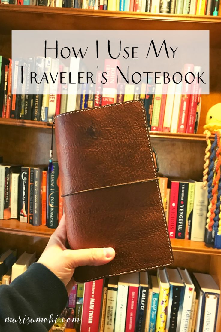 a person holding up a leather notebook in front of bookshelves with the title how i use my traveler's notebook