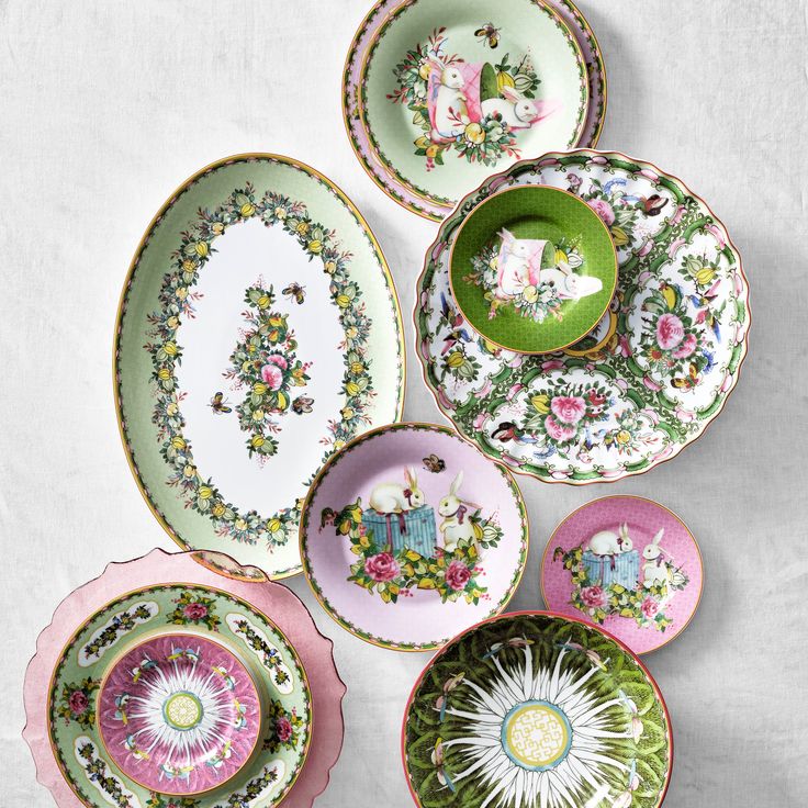 six plates with different designs on them sitting next to each other