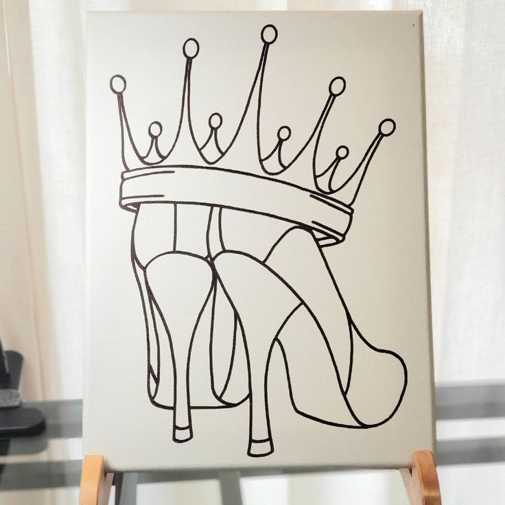 a drawing of a shoe with a crown on it