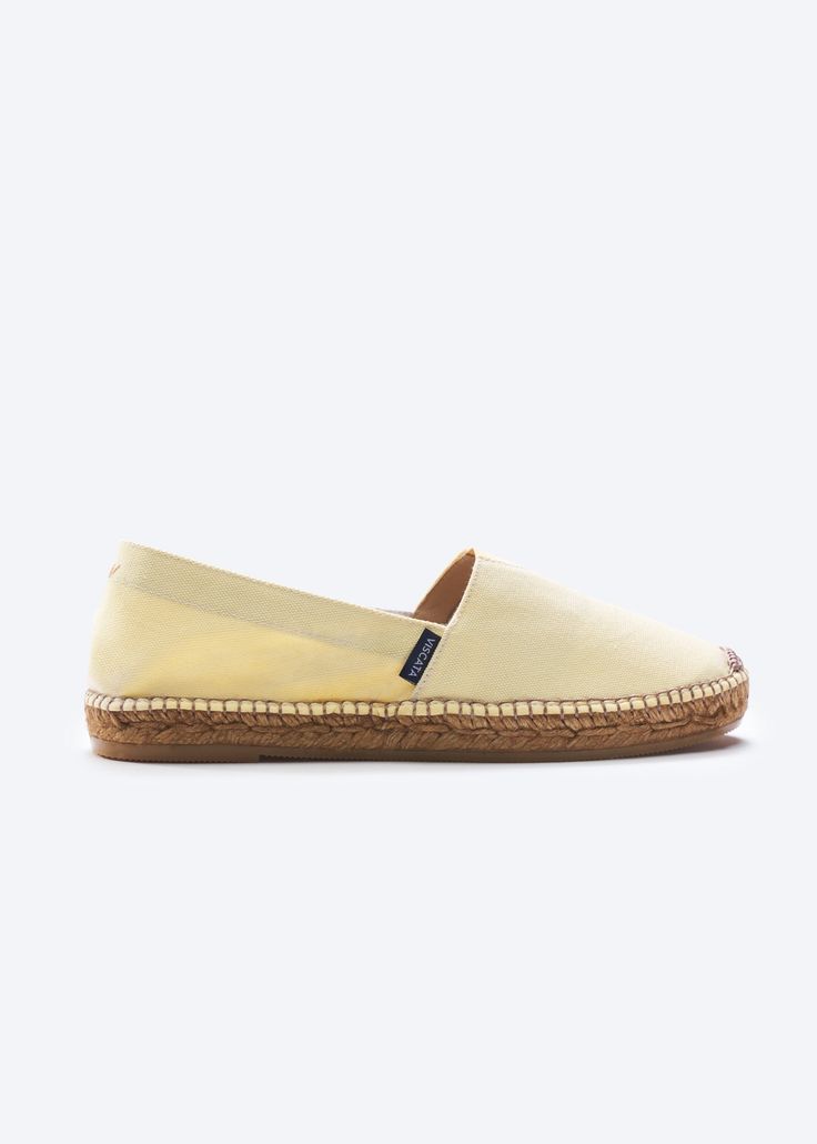 The perfect blend of comfort and versatility, these Barceloneta flat canvas espadrilles are just what you've always wished for. The perfect style partner for all your casual combos, these will soon become your best travel buddies. Lightweight, breathable and small enough to slip into your weekend bag, once you put them on you'll never want to take them off. TOP TIP: STYLE Lightweight and compact, once you put on these compact casuals, you'll never want to take them off. Slip on a pair of our bea Summer Beach Slip-ons With Textured Sole, Casual Yellow Closed Toe Slip-ons, Comfortable Slip-ons With Contrast Sole For Spring, Casual Summer Slip-on Loafers, Casual Natural Color Slip-ons For Spring, Summer Vacation Slip-ons With Rubber Sole, Rubber Sole Slip-ons For Summer Vacation, Casual Beige Loafers With Woven Sole, Comfortable Summer Slip-on Loafers