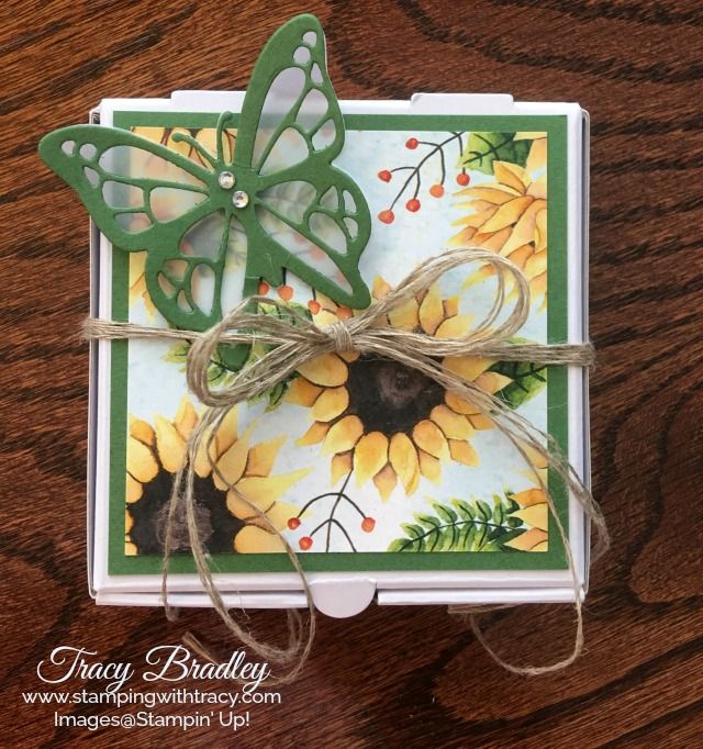 a close up of a greeting card with a butterfly on the front and sunflowers on the back