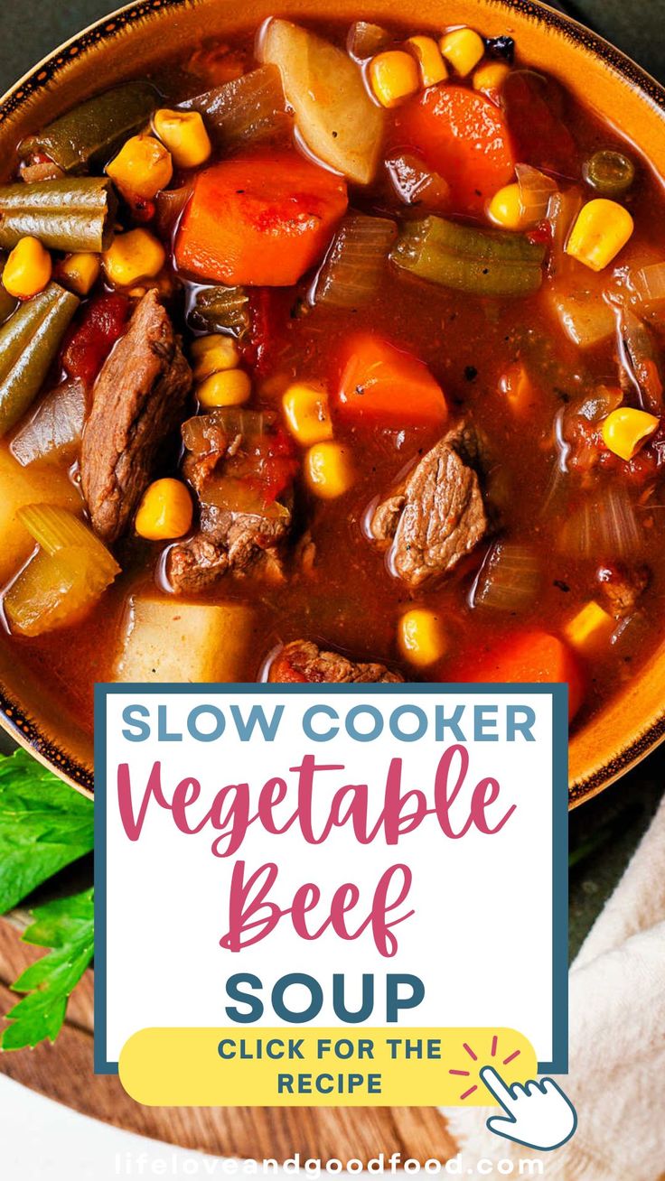 slow cooker vegetable beef soup in a bowl with corn and carrots on the side