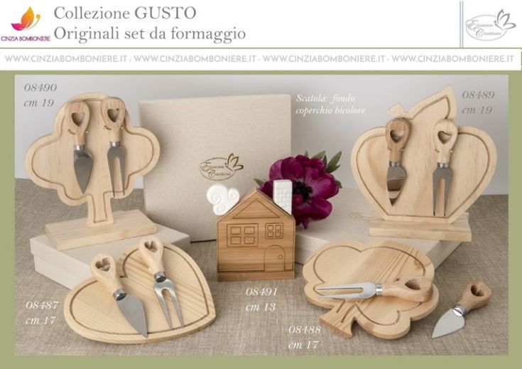 wooden utensils are arranged in the shape of hearts and houses, along with other items