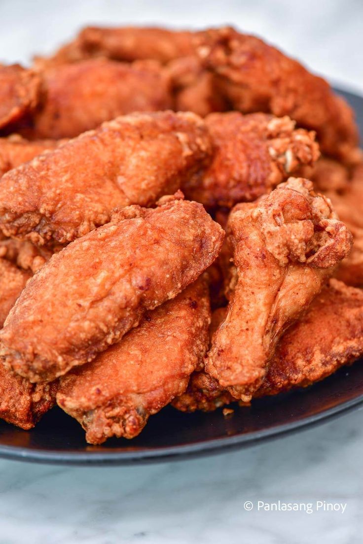 fried chicken pieces on a plate ready to be eaten