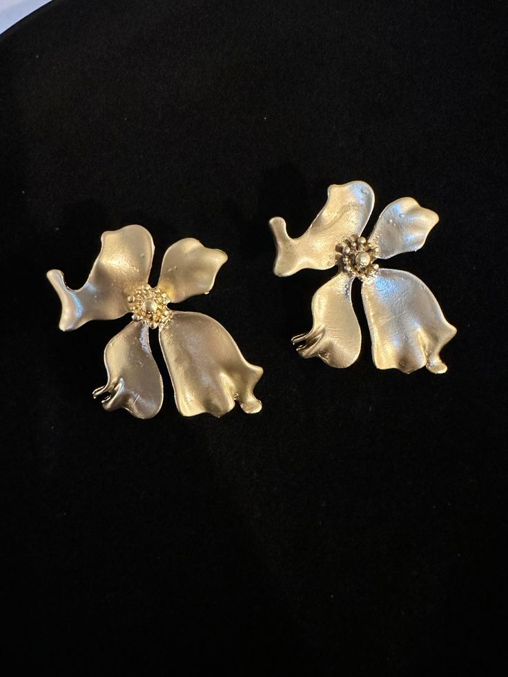 Take your chic look to a whole new level with these gold stud flower earrings. Perfect for everyday wear. Estimated Delivery: 3-4 Days Luxury Chic Flower Jewelry, Luxury Flower-shaped Evening Earrings, Affordable Elegant Metal Flower Earrings, Luxury Romantic Flower Earrings For Women, Luxury Feminine Flower Earrings For Wedding, Luxury Flower Shaped Earrings For Gift, Luxury Clip-on Flower-shaped Earrings, Cheap Brown Flower Earrings As Gift, Luxury Elegant Gold Flower Earrings