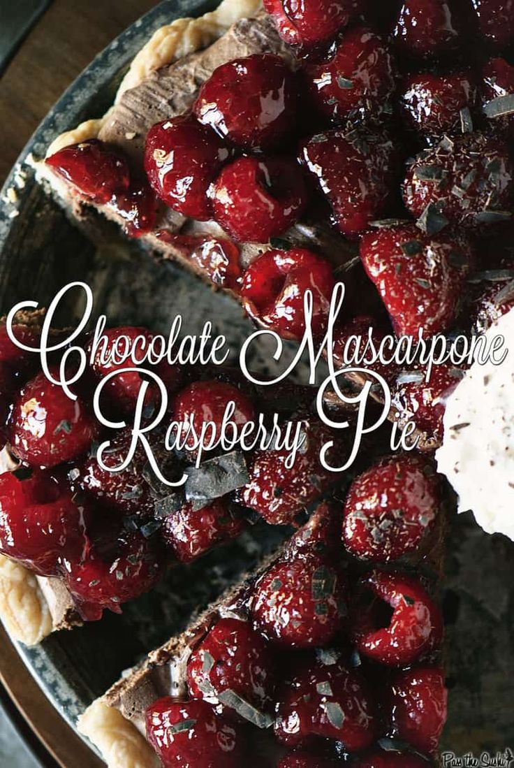 a chocolate and raspberry pie on a plate with the words, chocolate n'mascarpone raspberry pie