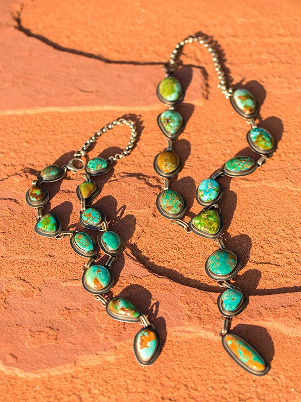 Obviously one of my favorite items to shoot. These necklaces showcase Royston turquoise, the most beautiful mix of ocean blue, forest greens and brilliant copper. Our stones are second to none, we go direct to the mine to choose the stones used to produce these amazing works of art, the best part is we get first choice at the mine! All of our Royston stones are hand-picked to create a unique, heirloom quality piece that you will enjoy for years to come. Gem quality turquoise set in sterling silv Artisan Turquoise Lariat Necklace Adjustable, Artisan Turquoise Adjustable Lariat Necklace, Artisan Adjustable Turquoise Lariat Necklace, Natural Stones Lariat Jewelry, Unique Lariat Jewelry With Natural Stones, Turquoise Lariat Gemstone Jewelry, Turquoise Natural Stones Lariat Jewelry, Turquoise Lariat With Natural Stones, Hand-strung Turquoise Lariat Jewelry