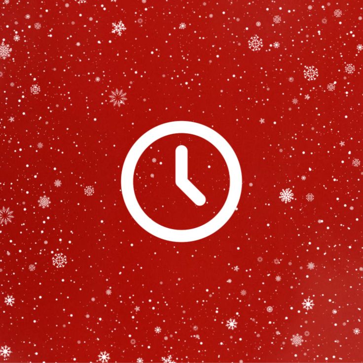 a red background with white snowflakes and a clock