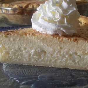 a piece of pie with whipped cream on top