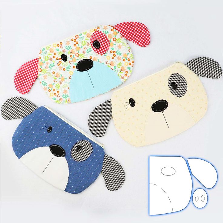 three dog shaped oven mitts are shown next to the cut outs for each one