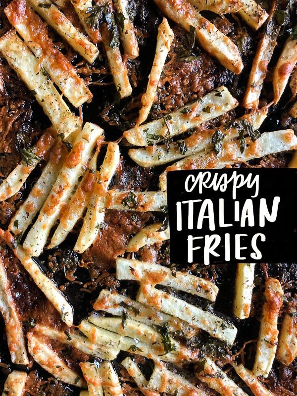 there is a pile of italian fries that are on top of the table with a sign reading grappy italian fries