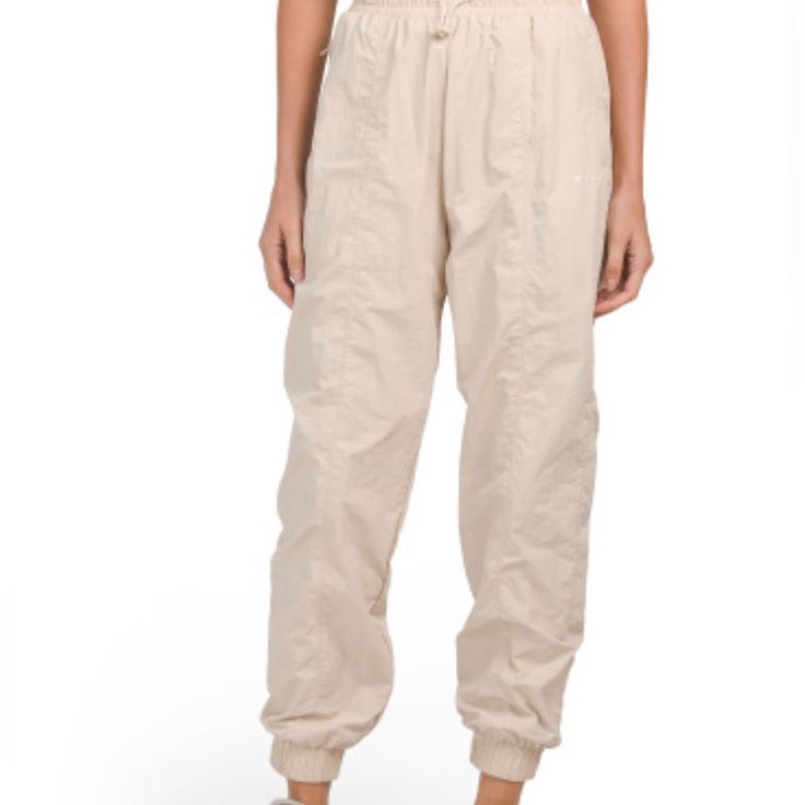 Nwt Never Worn Parachute Pants Beige Parachute Pants For Spring, Beige Utility Bottoms With Elastic Waistband, Beige High Waist Parachute Pants With Elastic Waistband, Beige High-waist Parachute Pants With Elastic Waistband, High-waisted Beige Parachute Pants With Elastic Waistband, Sporty Beige Bottoms For Spring, Beige Sporty Summer Pants, Sporty Beige Summer Pants, Sporty Beige Pants For Summer