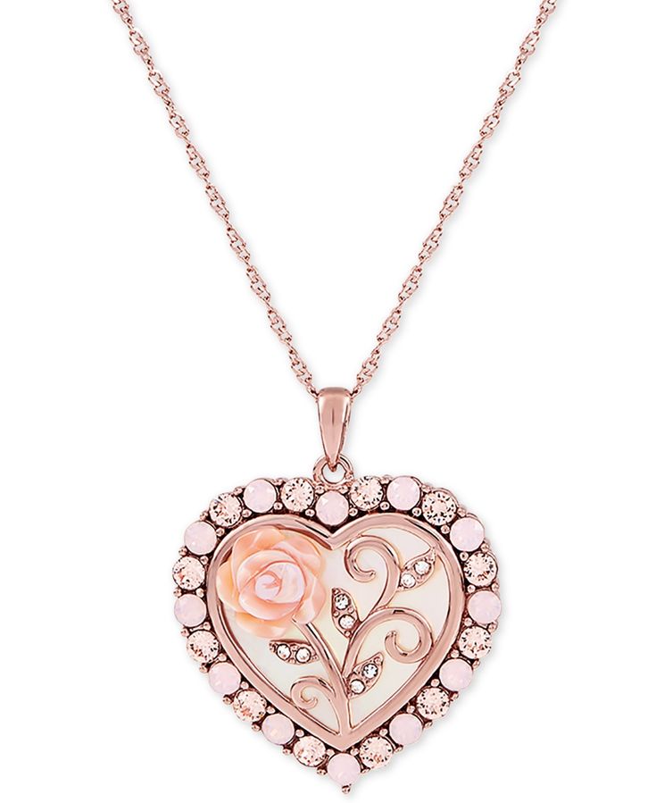 Vintage-inspired in its elegant detail, this cameo necklace features a heart-shaped with mother of pearl (16mm) pendant depicting a flowering rose. Cubic zirconia details provide a sparkling finish. Feminine Rose Jewelry For Valentine's Day, Elegant Rose Heart Shaped Necklace, Elegant Rose Heart Necklace, Feminine Rose Gold Jewelry With Rose Design, Valentine's Day Rose Gold Necklaces With Rose Design, Macy's Pink Jewelry For Wedding, Macy's Pink Wedding Jewelry, Valentine's Day Rose Gold Jewelry With Roses, Rose Gold Jewelry With Roses For Mother's Day