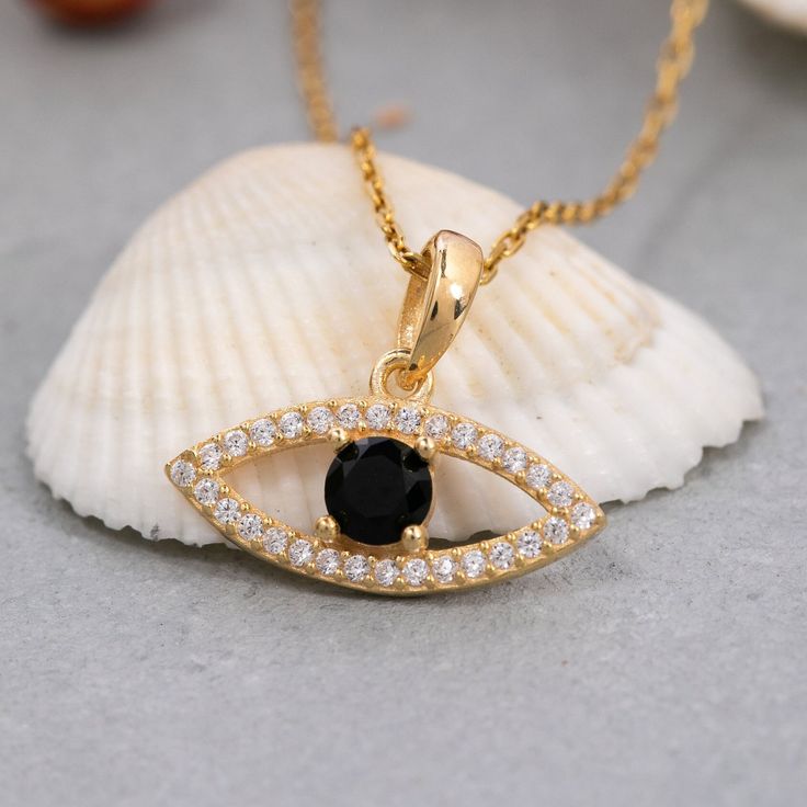 "★14K Solid Gold Evil Eye Necklace, 925 Sterling Silver Evil Eye Necklace, Black Evil Eye Necklace, Valentine's Day Gift, Mother's Day Gift★ ✔ FEATURES: -Gold KT: 14K Solid Gold and 925 Silver -Colors: 925 White Gold, 925 Rose Gold, 925 Yellow Gold, 14K White Gold, 14K Rose Gold, 14K Yellow Gold -Chain Lengths: 14\", 16\", 18\", 20\", 22\" -Chain Widths: 0.7mm -Chain Style: Box ✔ SHIPPING: -Ready to Ship in 1-3 Business Days -FREE shipping on all orders -Packed in a labeled gift box -The perfect birthday or holiday (Christmas, Hanukah, valentines day...etc.) gift! -We ship globally ✔ MY SHOP: Check out my shop https://www.etsy.com/shop/ErsJewelryDesign Or, Go Directly to My Sections: - Rings - https://etsy.me/3BsB1ei - Necklaces - https://etsy.me/3nDGV7C ✔ CARE INSTRUCTIONS: Providing high Black Necklaces With Birthstone For Anniversary, Black Birthstone Necklaces For Anniversary, Black Birthstone Necklace For Gift, Black Birthstone Necklace For Gifts, Black Birthstone Necklace For Anniversary, Black Pendant Necklaces For Anniversary, Black Cubic Zirconia Pendant Jewelry, Black Pendant Jewelry Gift For Her, Black Pendant Jewelry As Gift For Her