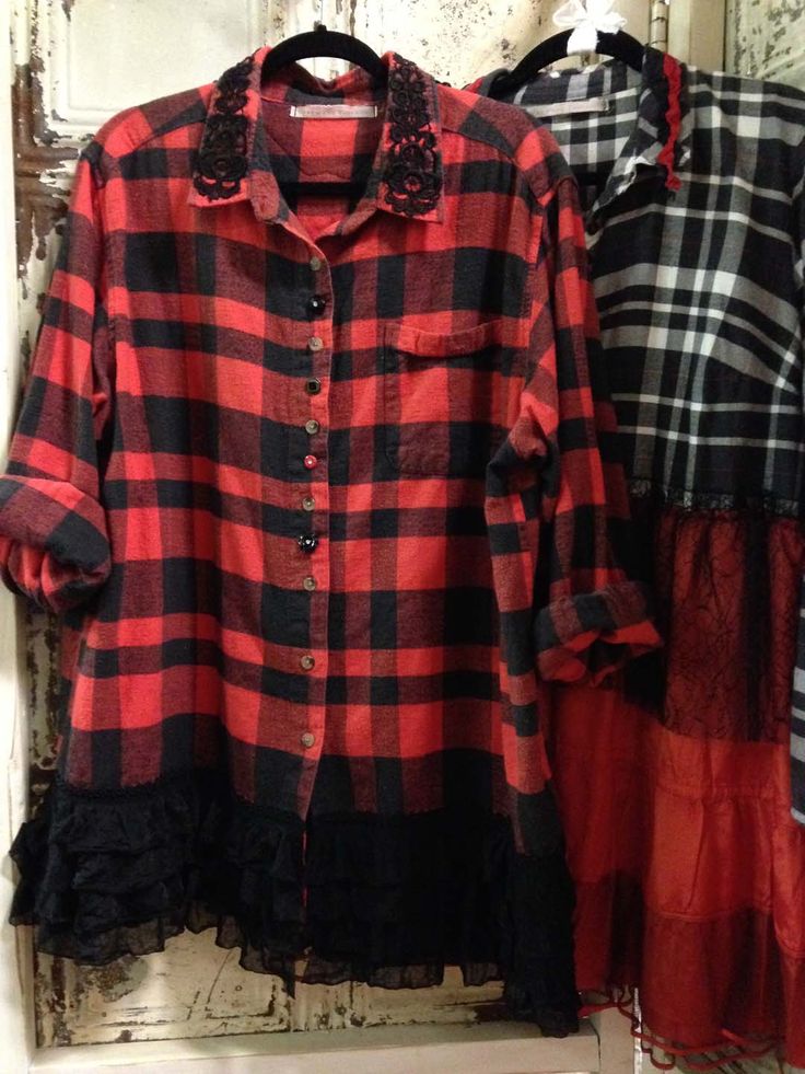 red and black plaid shirts hanging on the wall next to another shirt with ruffles