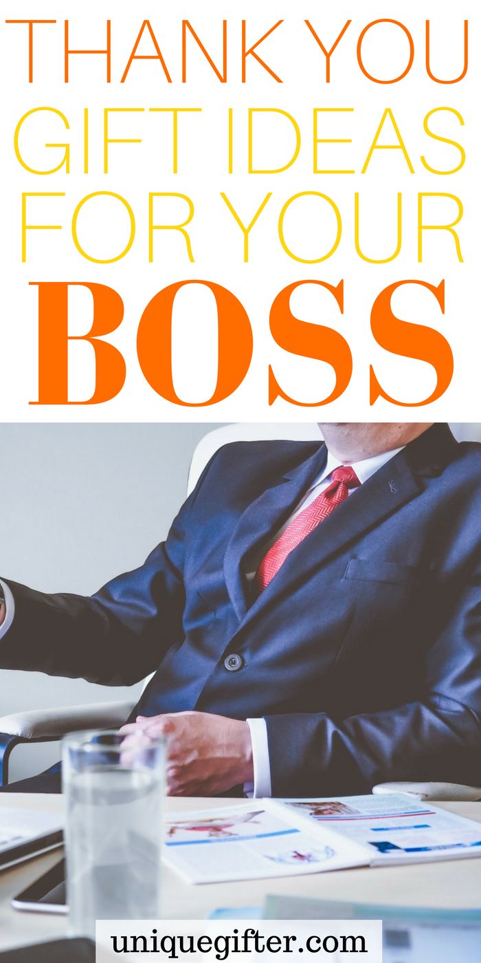 a man in a suit sitting at a desk with the words thank you gift ideas for your boss