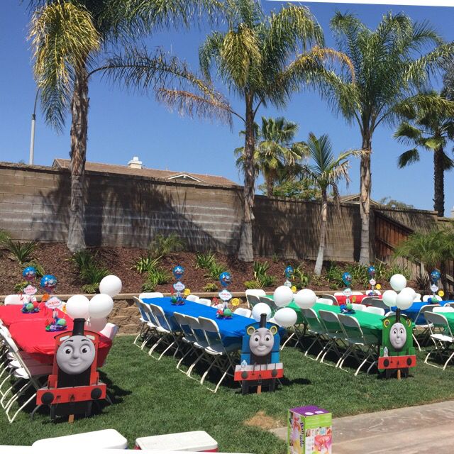 thomas the tank engine birthday party setup with balloons and decorations for children's birthday