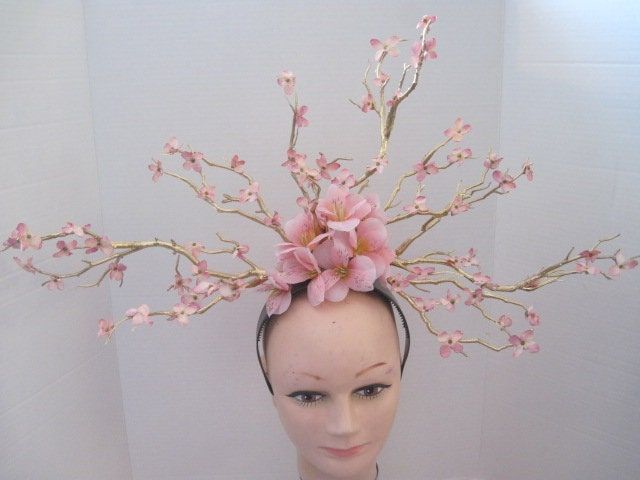 *  This is a statement piece and walk into any event and heads will turn.  This gold branch fascinator has been covered in feminine pink flowers with a center of Alstroemeria a delicate and soft looking flower. *   It is light weight, evenly balanced and comfortable to wear designed on an acrylic headband.   *  Bold for the gal who wants to be noticed. *  Great for a adventurous spirit it would be great for Derby Events & Celebrations, Weddings, High Tea, Fashion Show, Garden Party, Ladies Lunch High Tea Fashion, Acrylic Headband, Party Ladies, Ladies Lunch, Gold Branches, Costume Hats, High Tea, Garden Party, Fascinator