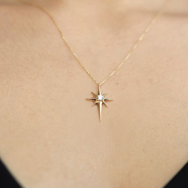 This stunning 14k Solid Gold Pole Star Necklace is the perfect gift for your special someone. Featuring a delicate North Star pendant crafted from real gold, this necklace is a beautiful symbol of guidance and hope. Whether you're looking for a birthday gift, anniversary gift, or a thoughtful surprise for your girlfriend, this elegant piece is sure to make a lasting impression.  *Free Express International Shipping *Free returns within 14 days from the order date. *14K solid gold chain is includ Star-shaped Yellow Gold Birthstone Necklace, Yellow Gold Star Necklace With Birthstone, Yellow Gold Star Shaped Necklace With Birthstone, Elegant Starburst Jewelry As Gift, Elegant Starburst Jewelry Gift, 14k Gold Star-shaped Jewelry For Anniversary, 14k Gold Star Charm Jewelry Gift, 14k Gold Jewelry With Star Charm For Anniversary, 14k Gold Jewelry With Star Charm Gift