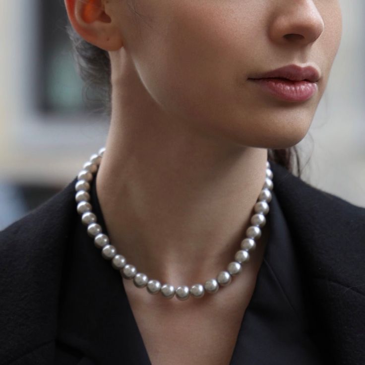 Introducing the Mirage Necklace, a true embodiment of elegance and sophistication. Handcrafted with artisan pearls, this 42cm necklace is made in Italy with meticulous attention to detail. Its timeless aesthetic and luxurious feel make it a must-have accessory for any occasion. Material: Artisan pearls Length: 42 cm With a magnetic clasp, it offers convenience and security Made in: Italy The necklace sits gracefully at the collarbone, complementing both high and low necklines effortlessly. Custo The Mirage, Timeless Aesthetic, Low Neckline, Simple Blouse, Real Pearls, The Grace, Elevate Your Look, Magnetic Clasp, Classic Looks