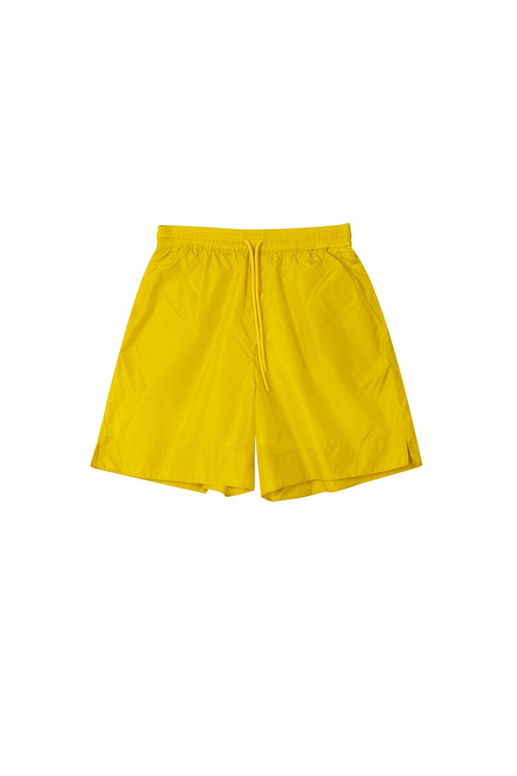 Details: Youthful and energetic honey yellow tone shorts Built-in anti-shine mesh lining Elastic waistband with drawstring lining Diamonds triangle label Loose leg Pair with VC Lemon Sunscreen Jacket Materials & Care: Fabric: Nylon 100% Lining: Polyester 100% Hand wash | Dry clean Do not bleach Size & Fit: Model is 5'7", Bust 32, Waist 24, Hips 35, wearing a size S Item #: IM2PA22 Athleisure Swim Trunks For Summer Streetwear, Summer Streetwear Athleisure Bottoms, Spring Streetwear Shorts With Drawstring, Summer Athleisure Streetwear Bottoms, Spring Nylon Drawstring Shorts, Summer Streetwear Athletic Shorts With Elastic Waistband, Stretch Nylon Shorts For Summer, Spring Streetwear Athletic Shorts, Summer Streetwear Knee-length Athletic Shorts