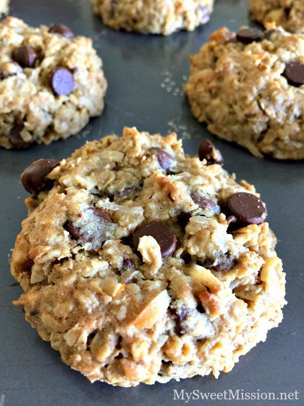 cookies with chocolate chips and oats on a baking sheet