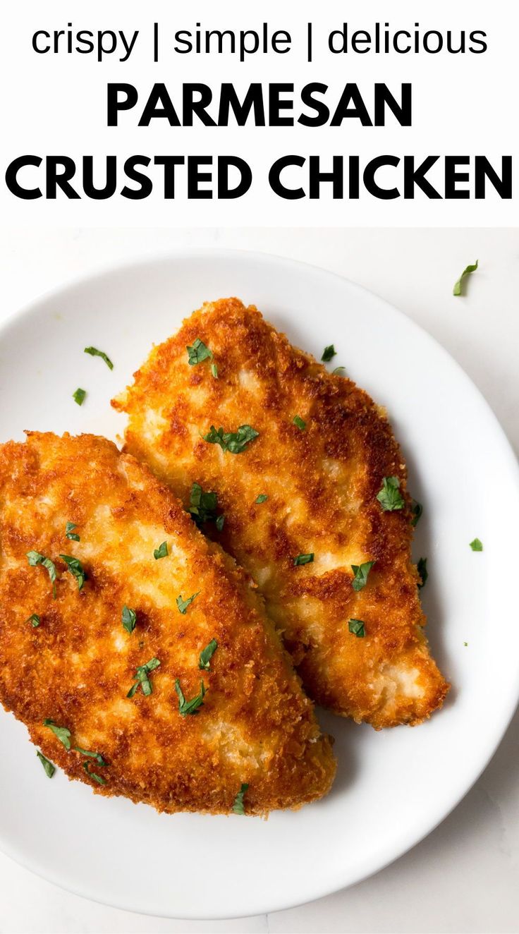 two pieces of parmesan chicken on a white plate with the words crispy simple delicious