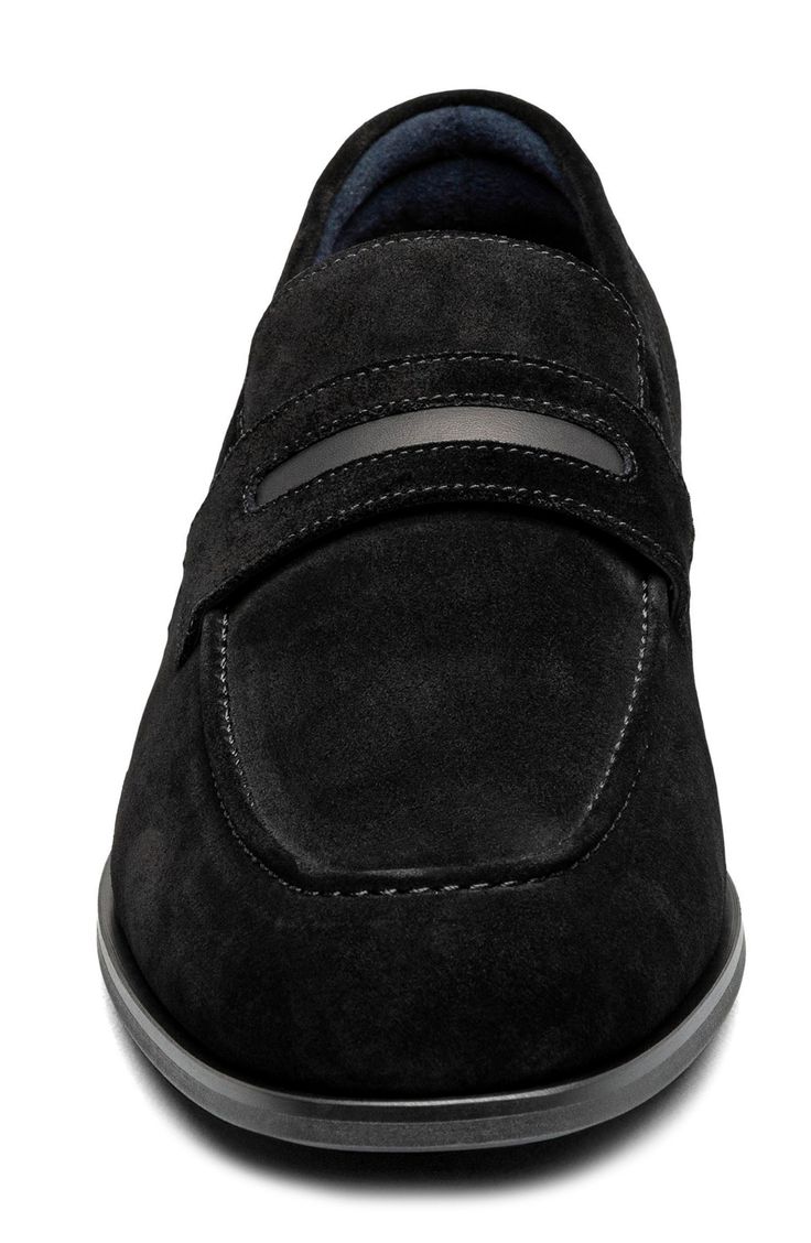 A slim penny keeper and moc toe add timeless elements to a sophisticated loafer set on a cushioned insole for comfortable wear. Removable, cushioned insole with arch support Leather upper/textile lining/rubber sole Imported Elegant Black Slip-ons With Ortholite Insole, Business Casual Slip-on Loafers With Ortholite Insole, Modern Formal Slip-ons With Ortholite Insole, Classic Business Loafers With Ortholite Insole, Business Casual Loafers With Ortholite Insole And Plain Toe, Classic Moc Toe Slip-ons With Cushioned Footbed, Classic Slip-on Dress Shoes With Ortholite Insole, Formal Slip-on Moccasins With Ortholite Insole, Formal Slip-on Loafers With Ortholite Insole