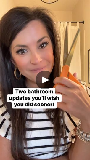 a woman is holding up a pair of scissors to her face with the caption two bathroom updates you'll wish you did someone