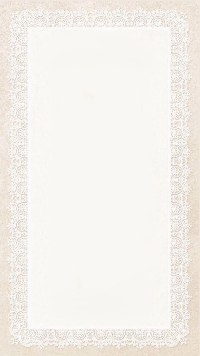 a white lace border on top of a piece of paper with an empty space in the middle