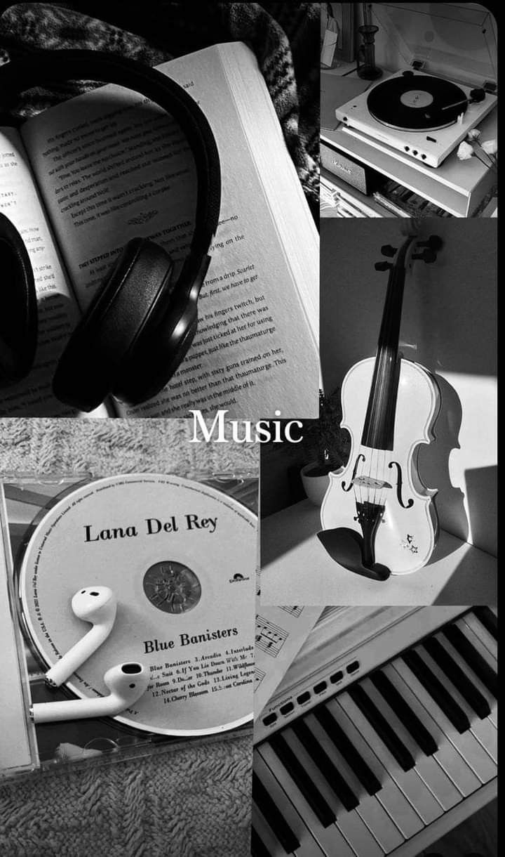 black and white photograph of music with headphones, book, violin, piano, sheet music