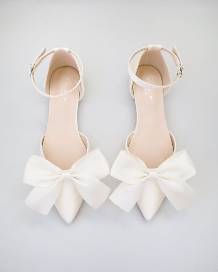 Ivory Satin Pointy Toe Flats with Front Satin Bow Elegant Flats With Satin Bow And Round Toe, Elegant Ballet Flats With Satin Bow, Low Heel Wedding Shoes With Bow For Party, Closed Toe Wedding Shoes With Bow For Prom, Chic Low Heel Wedding Shoes With Satin Bow, Elegant Flats With Satin Bow, Low Heel Wedding Shoes With Bow, Elegant Evening Ballet Flats With Satin Bow, Party Ballet Flats With Bow And Low Heel