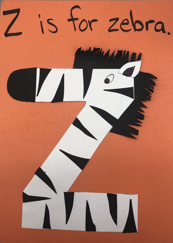 the letter z is for zebra made out of cut up pieces of paper on an orange background