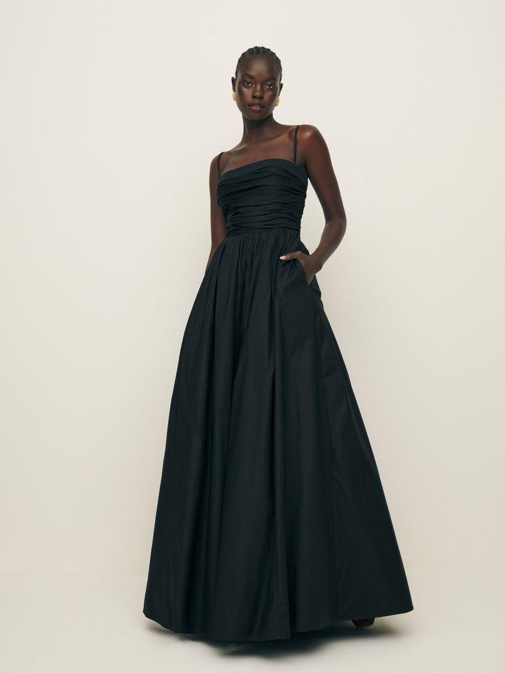 Weddings are in the air. Shop the Kastoria Dress from Reformation, a fitted maxi dress with a straight neckline, a-line skirt, and a pleated front. Pleated Bodice A-line Gown For Gala, A-line Gown With Pleated Bodice For Gala, Pre-draped Strapless Dress With Pleated Bodice For Wedding, A-line Maxi Dress With Lined Bodice For Gala, Formal Strapless Dress With Pleated Waist, Pre-draped A-line Maxi Dress For Wedding, Strapless Pleated Maxi Dress For Gala, Formal Strapless A-line Dress With Ruched Bodice, Cocktail Evening Dress With Pleated Bodice, A-line Silhouette