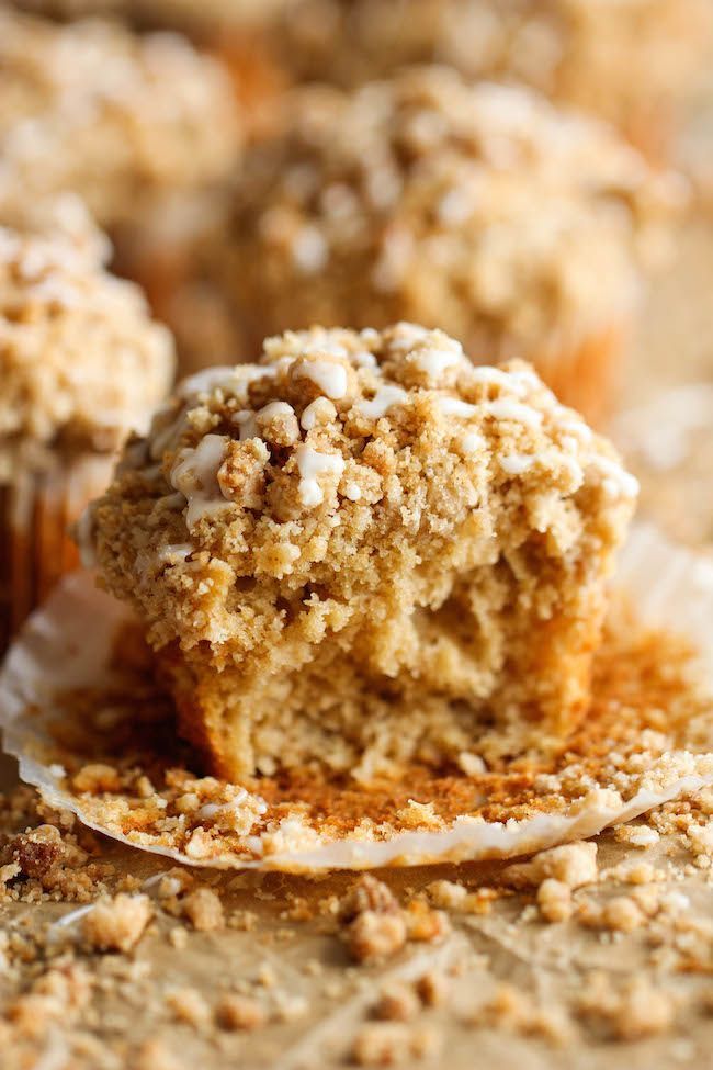 a muffin that has been cut in half and is sitting on top of another muffin