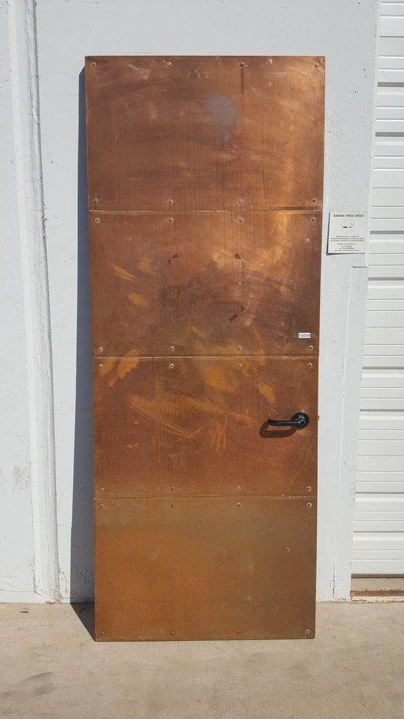 the door is made out of wood and metal