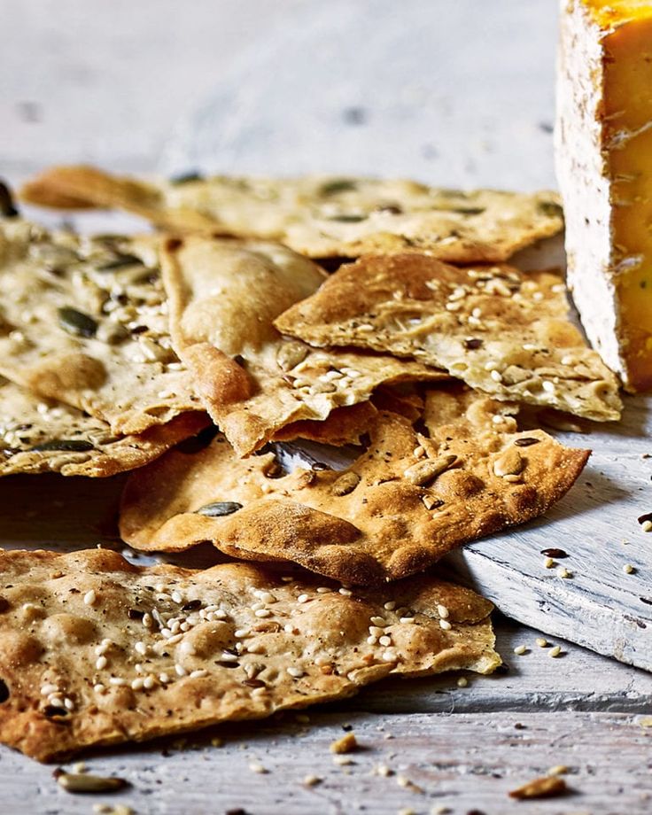 some crackers and cheese on a table