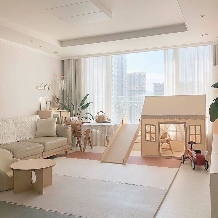 a living room filled with furniture and a slide in the middle of it's floor