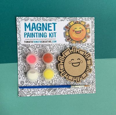 the magnet painting kit includes three different colored paints and a wooden sun brooch pin