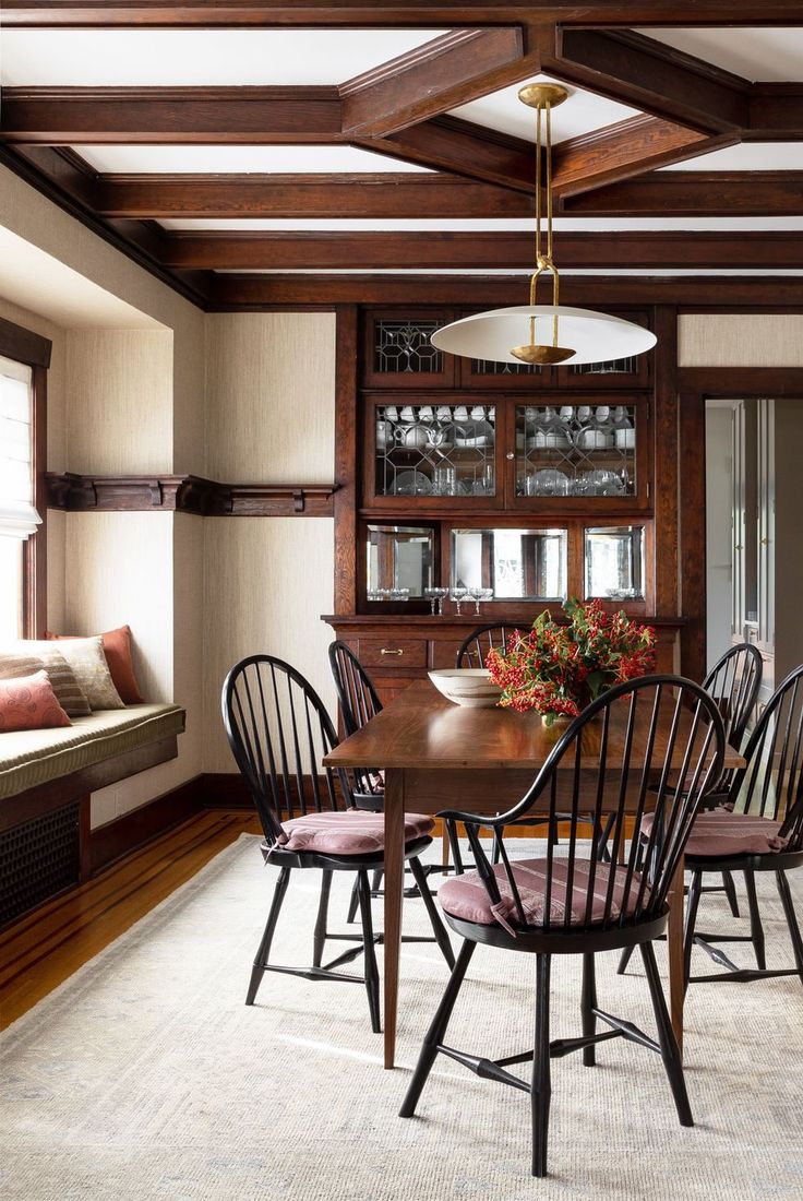 the dining room table is surrounded by chairs and other furniture, along with an area rug on the floor