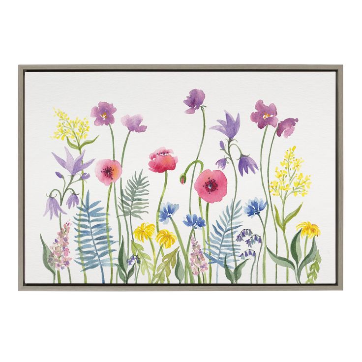 watercolor painting of flowers and ferns on white paper, framed in wood frame with black border