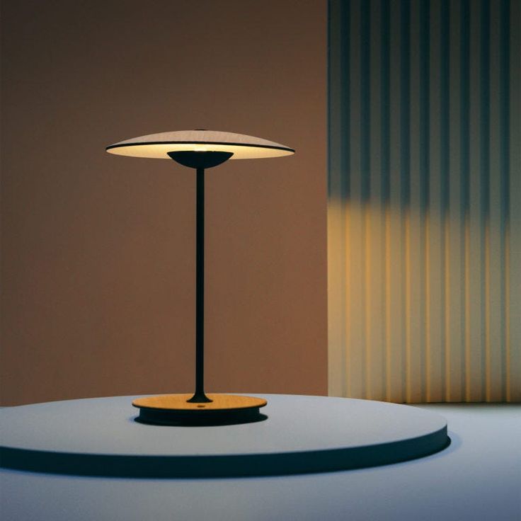 a lamp sitting on top of a white table