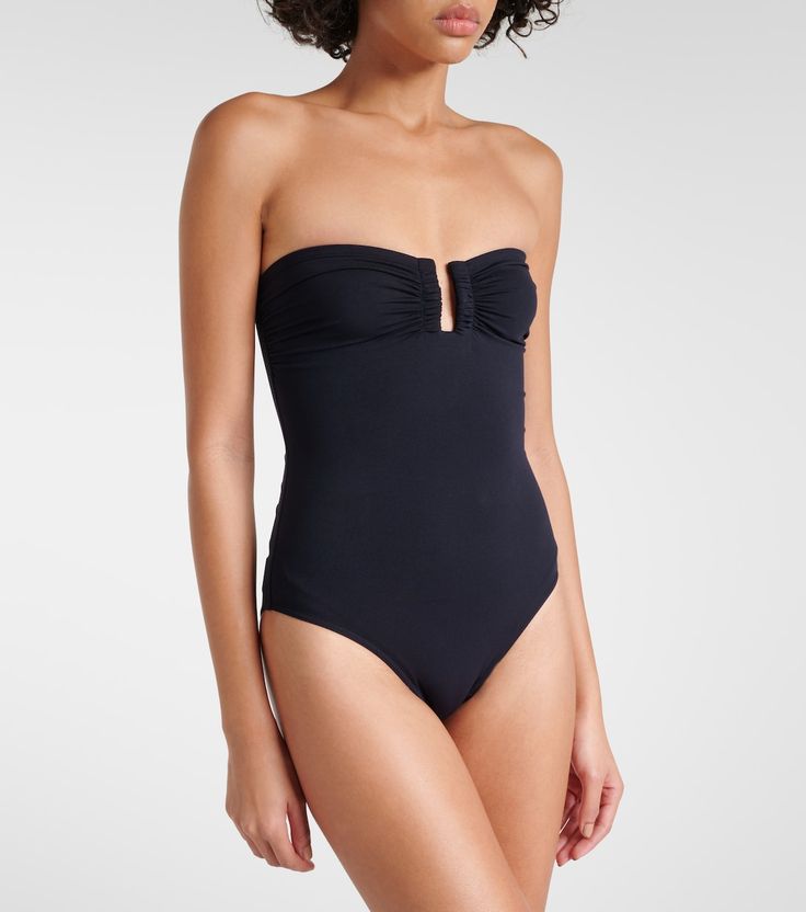 Cassiopée bandeau swimsuit in black - Eres | Mytheresa Chic Bandeau Swimwear For Swimming, Elegant Bandeau Swimwear For Beach Season, Strapless Swimwear For Poolside, Modern Swimwear For Summer, Modern Summer Swimwear, Chic Bandeau Swimwear For Poolside, Bandeau Beachwear Swimwear For Pool, Bandeau Swimwear For Pool Beachwear, Bandeau Swimwear For Pool And Beach