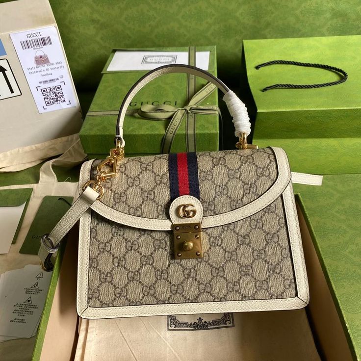 Contact us: contact@profxnz.com if you need assistance - Gucci bags sale: grab the latest styles at amazing prices - 712This is a premium quality clone , similar like the original ones, even no one can judge either it&apos;s a clone or originalSize: (25*17.5*7cm)It comes with Dust box, Care manual, Tag and Paper bag. Gucci Top Handle Bag, Gucci Top, Alternative Metal, Brand Bags, Gucci Bags, Branded Handbags, Handle Bag, Small Tops, Wallet Case